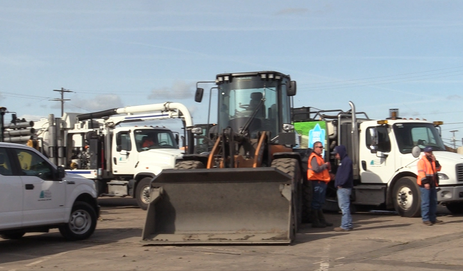 City of Walla Walla vehicles, heavy equipment, and operators in a parking lot