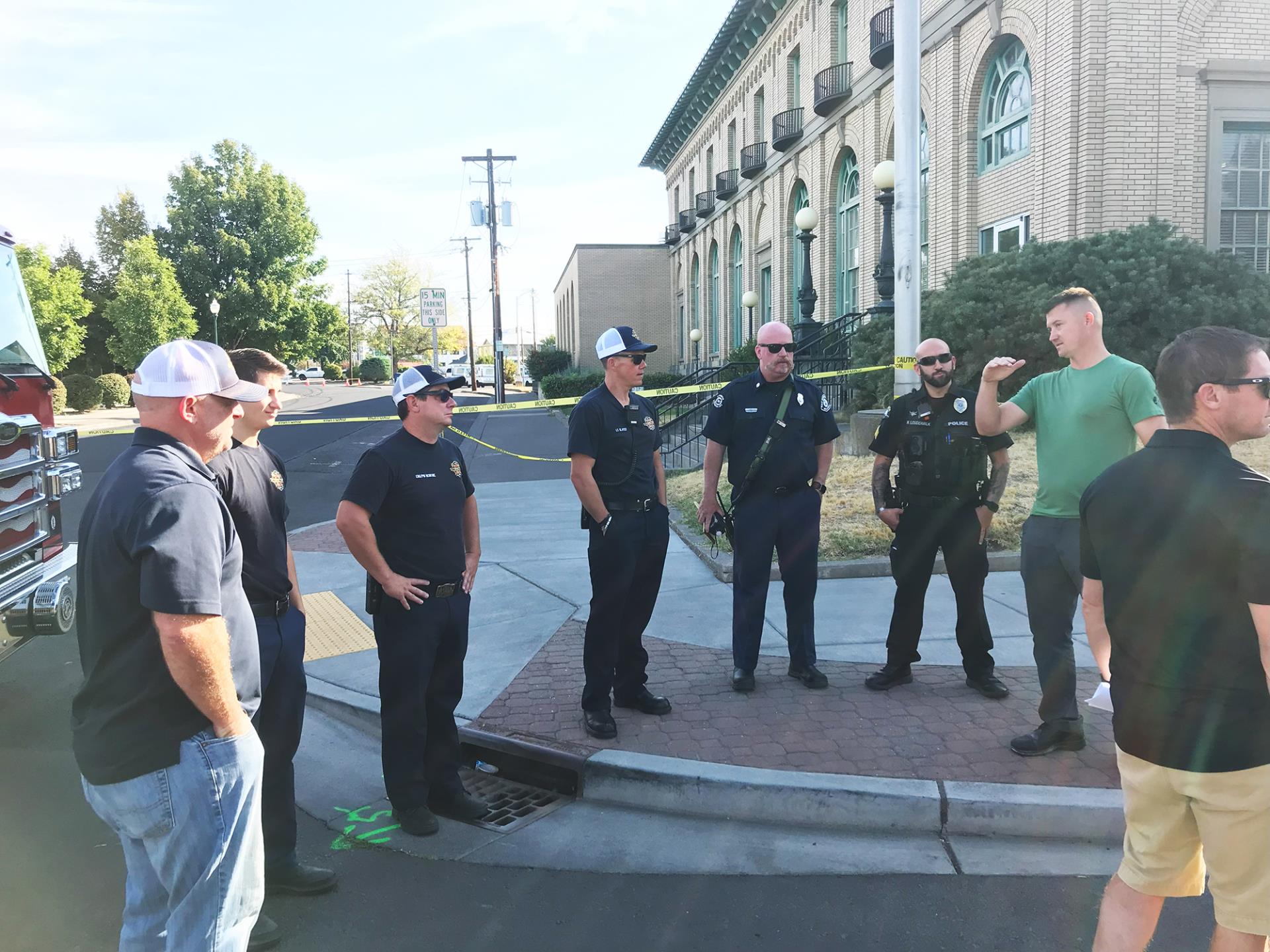 Walla Walla Fire and Police personnel are briefed by a Clean Harbors official