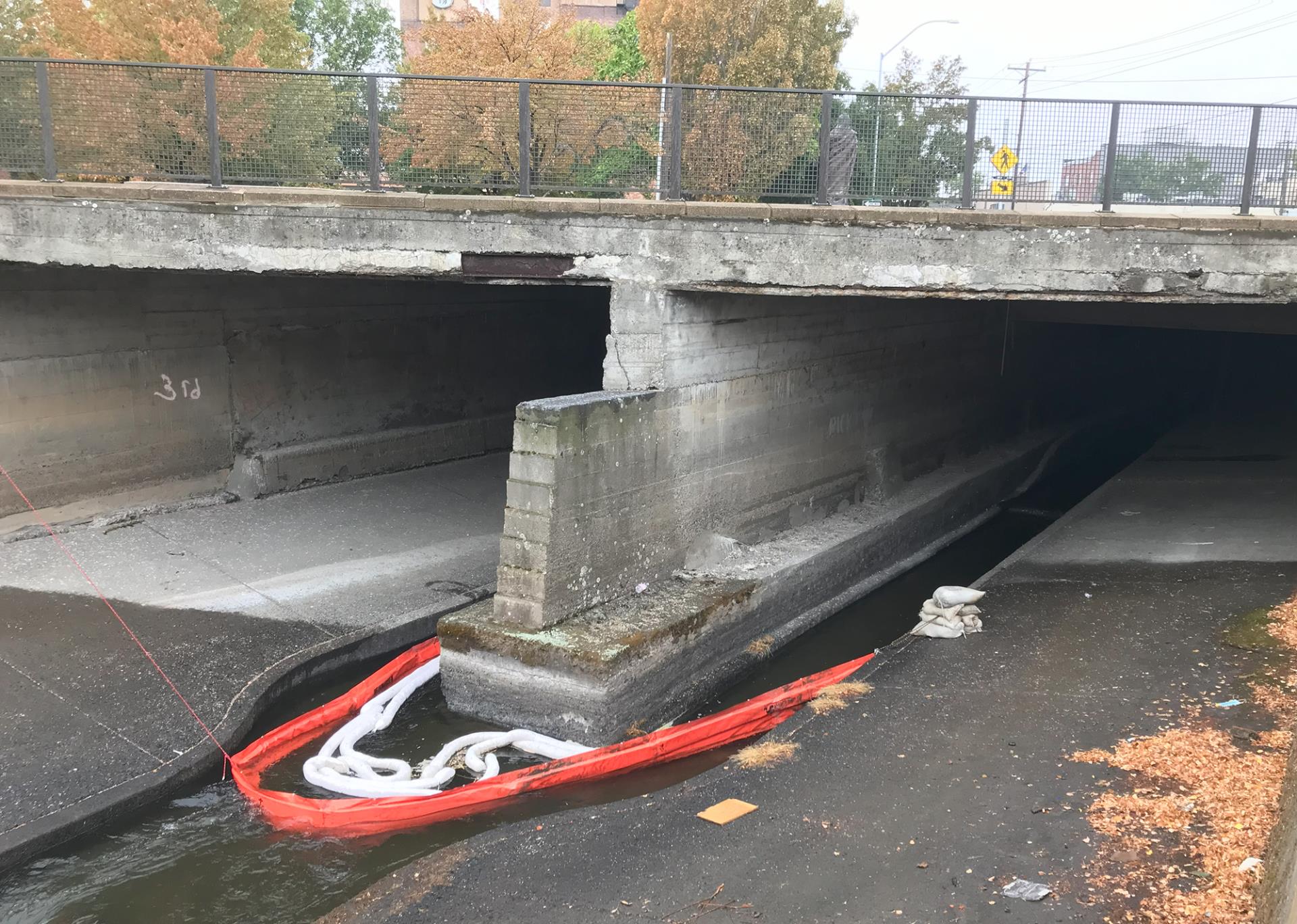 A collection boom installed as a precaution in the Mill Creek Channel west of 3rd Avenue.