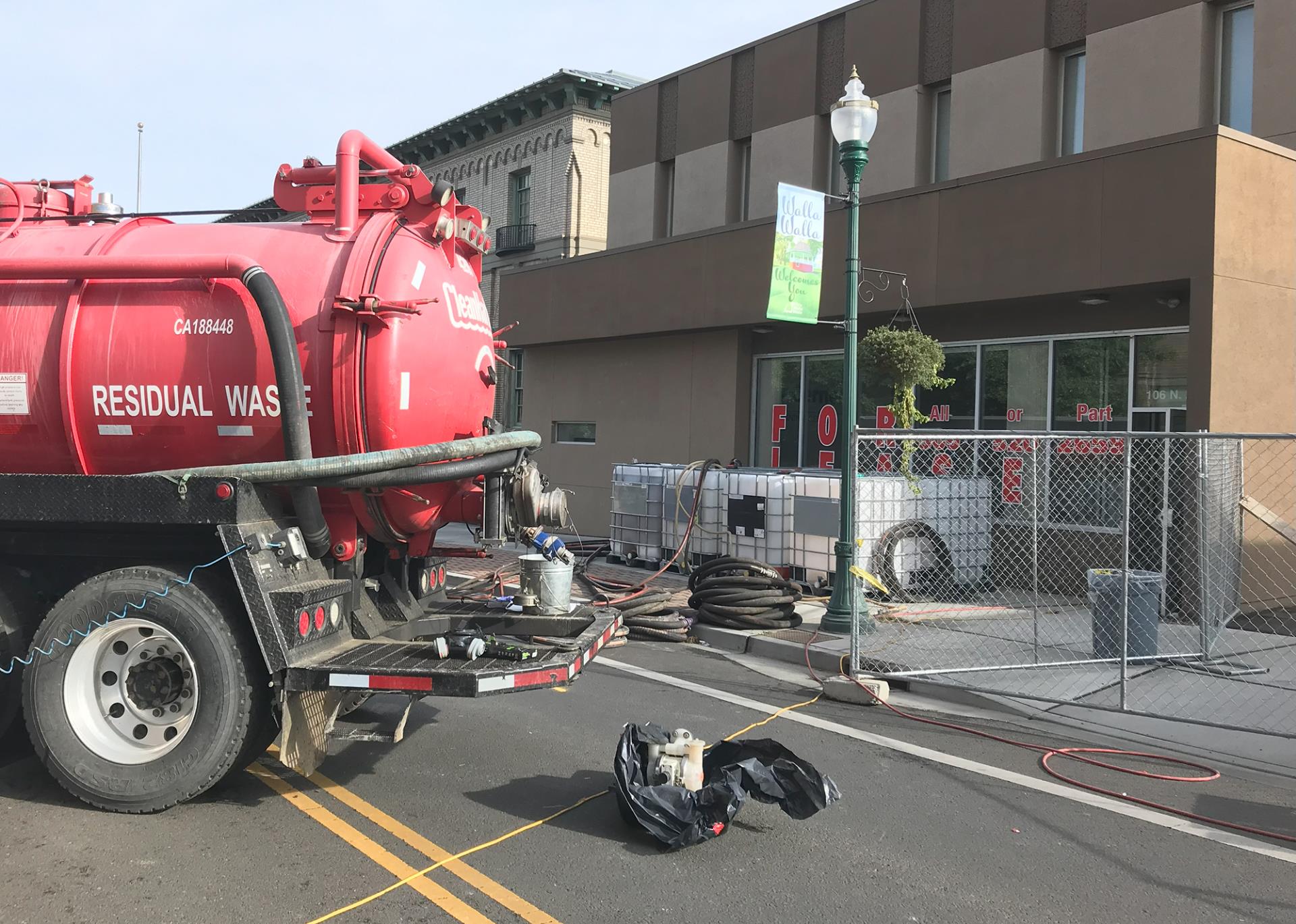 Response equipment is positioned around the front entrance of the building at 106 N. 2nd Ave., on Sept. 23, 2023.