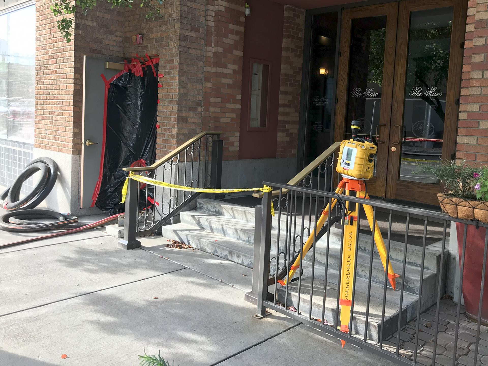 An air quality monitor stands near the outlet to 2nd Avenue of the ventilation system at the Marcus Whitman Hotel, on Sept. 23, 2023.