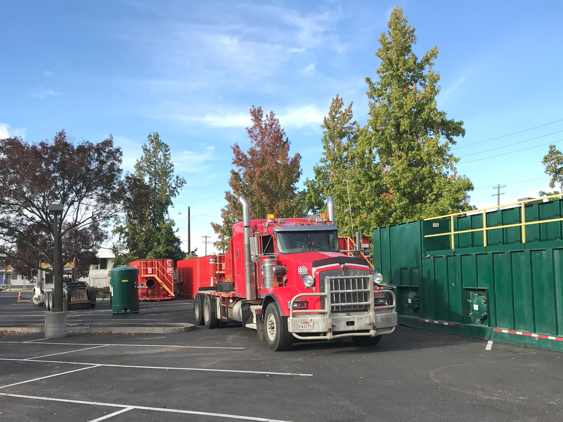 A driver prepares to remove a frac tank from its location in the north lot of the Marcus Whitman Hotel, on Oct. 17, 2023.