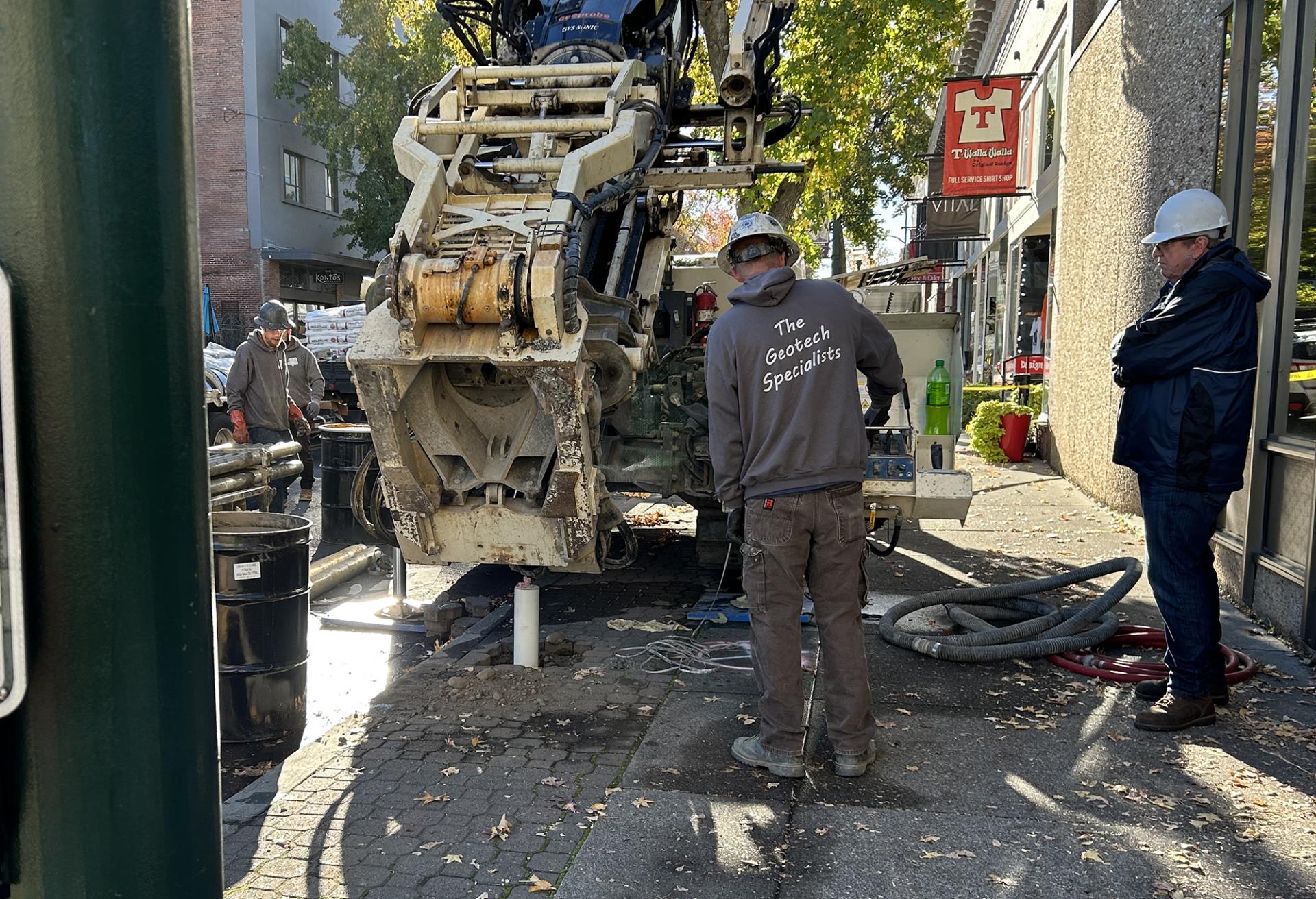 A crew places a monitoring well near 2nd and Rose on Oct. 18, 2023.